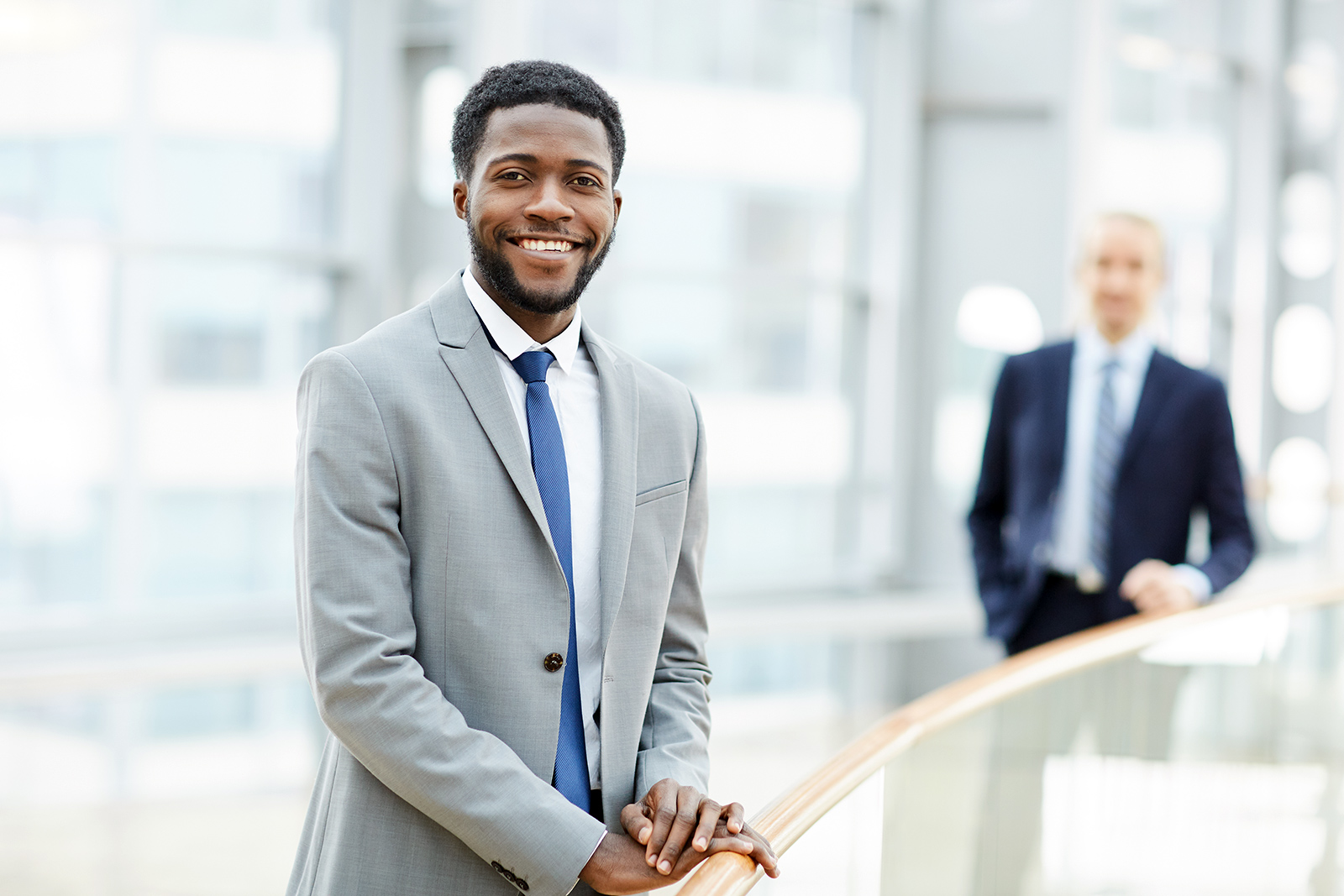 smiling-black-businessman-LUTNGCF.jpg